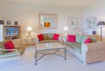 Comfy sitting area and large flat screen TV in the living room